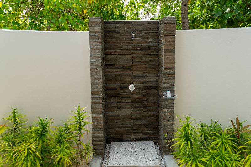 Elegant Shower with Stone Tiles